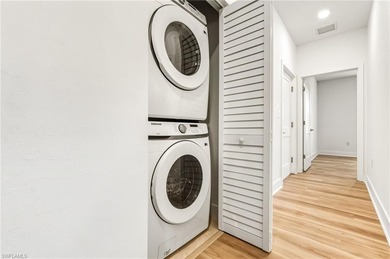 This beautifully situated FIRST FLOOR END unit carriage home in on Highland Woods Golf and Country Club in Florida - for sale on GolfHomes.com, golf home, golf lot