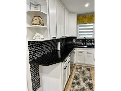 Welcome to your dream home! This gorgeous, contemporary on Pocono Farms Country Club in Pennsylvania - for sale on GolfHomes.com, golf home, golf lot