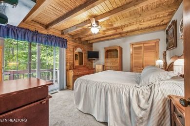 Discover a light-filled Jim Barna log home designed for quiet on Heatherhurst Golf Course in Tennessee - for sale on GolfHomes.com, golf home, golf lot