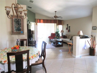 A 2/3 bedroom, 2 bath villa with wonderful lake views and a on Sabal Trace Golf and Country Club in Florida - for sale on GolfHomes.com, golf home, golf lot