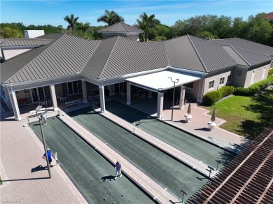 This sunny and bright first floor coach home with southern on Pelican Marsh Golf Club in Florida - for sale on GolfHomes.com, golf home, golf lot