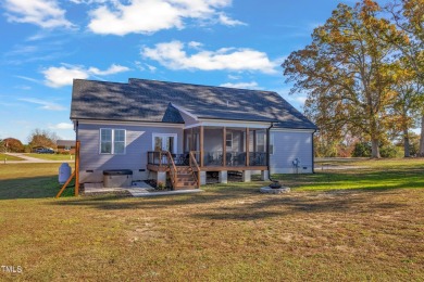 This beautifully UPGRADED like-new home on an acre lot is only on Kerr Lake Country Club in North Carolina - for sale on GolfHomes.com, golf home, golf lot