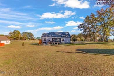 This beautifully UPGRADED like-new home on an acre lot is only on Kerr Lake Country Club in North Carolina - for sale on GolfHomes.com, golf home, golf lot