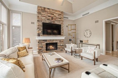 Perched gracefully above the landscape, this Oakhurst residence on Oakhurst Golf and Country Club in Michigan - for sale on GolfHomes.com, golf home, golf lot