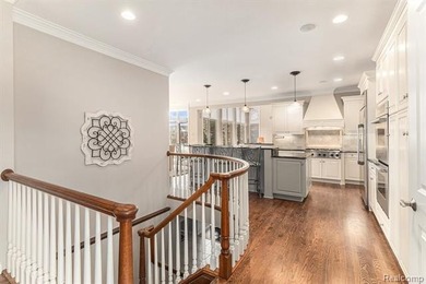 Perched gracefully above the landscape, this Oakhurst residence on Oakhurst Golf and Country Club in Michigan - for sale on GolfHomes.com, golf home, golf lot