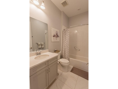 Rivella! Step into luxury with this exquisite 2 bed, 2 bath + on Club Med Sandpiper in Florida - for sale on GolfHomes.com, golf home, golf lot