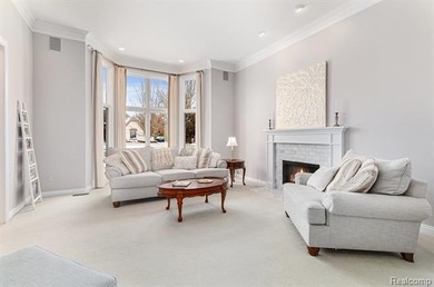 Perched gracefully above the landscape, this Oakhurst residence on Oakhurst Golf and Country Club in Michigan - for sale on GolfHomes.com, golf home, golf lot