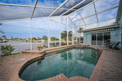 Welcome to your ultimate waterfront retreat in Punta Gorda Isles on Saint Andrews South Golf Club in Florida - for sale on GolfHomes.com, golf home, golf lot