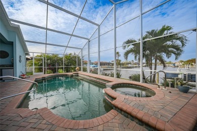 Welcome to your ultimate waterfront retreat in Punta Gorda Isles on Saint Andrews South Golf Club in Florida - for sale on GolfHomes.com, golf home, golf lot