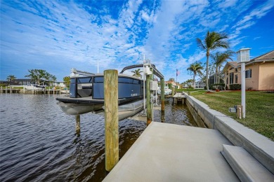 Welcome to your ultimate waterfront retreat in Punta Gorda Isles on Saint Andrews South Golf Club in Florida - for sale on GolfHomes.com, golf home, golf lot