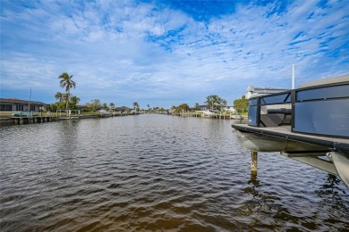 Welcome to your ultimate waterfront retreat in Punta Gorda Isles on Saint Andrews South Golf Club in Florida - for sale on GolfHomes.com, golf home, golf lot