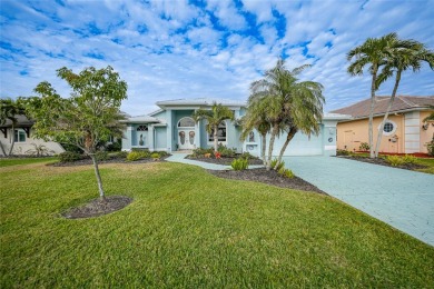 Welcome to your ultimate waterfront retreat in Punta Gorda Isles on Saint Andrews South Golf Club in Florida - for sale on GolfHomes.com, golf home, golf lot