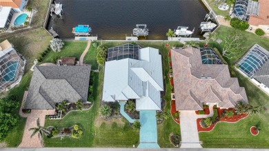 Welcome to your ultimate waterfront retreat in Punta Gorda Isles on Saint Andrews South Golf Club in Florida - for sale on GolfHomes.com, golf home, golf lot