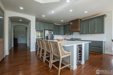 Located in a quiet cul-de-sac on an oversized lot, this on Pelican Lakes Golf and Country Club in Colorado - for sale on GolfHomes.com, golf home, golf lot