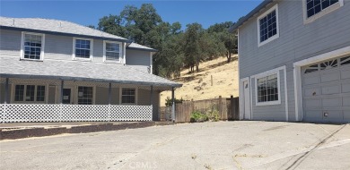 Up on the hilltop, private drive way at then end of a cul de sac on Hidden Valley Lake Golf and Country Club in California - for sale on GolfHomes.com, golf home, golf lot