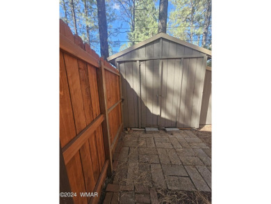 REDUCED PRICE FOR A LUCKY NEW OWNERS!! Nestled among towering on Pinetop Lakes Golf and Country Club in Arizona - for sale on GolfHomes.com, golf home, golf lot