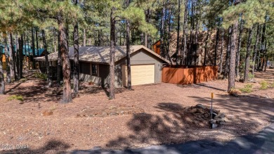 REDUCED PRICE FOR A LUCKY NEW OWNERS!! Nestled among towering on Pinetop Lakes Golf and Country Club in Arizona - for sale on GolfHomes.com, golf home, golf lot