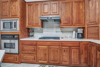 This impressive two-story, 5-bedroom, 4 and a half bathroom home on The Trails of Frisco Golf Club in Texas - for sale on GolfHomes.com, golf home, golf lot