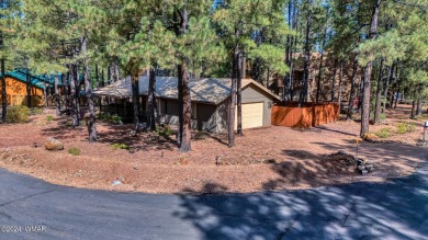 REDUCED PRICE FOR A LUCKY NEW OWNERS!! Nestled among towering on Pinetop Lakes Golf and Country Club in Arizona - for sale on GolfHomes.com, golf home, golf lot