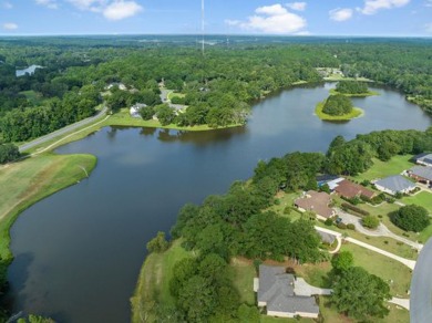 One and a half acre lot with a gorgeous view down the 16th par 4 on The Golf Club At Summerbrooke in Florida - for sale on GolfHomes.com, golf home, golf lot