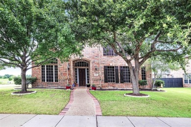 This impressive two-story, 5-bedroom, 4 and a half bathroom home on The Trails of Frisco Golf Club in Texas - for sale on GolfHomes.com, golf home, golf lot