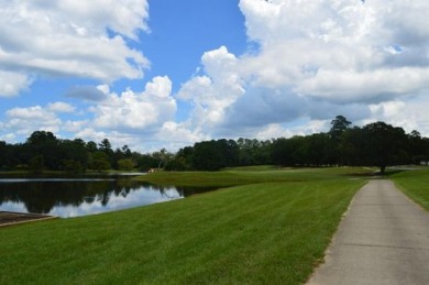 One and a half acre lot with a gorgeous view down the 16th par 4 on The Golf Club At Summerbrooke in Florida - for sale on GolfHomes.com, golf home, golf lot