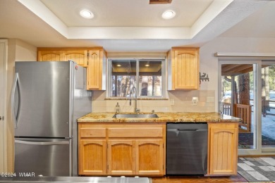 REDUCED PRICE FOR A LUCKY NEW OWNERS!! Nestled among towering on Pinetop Lakes Golf and Country Club in Arizona - for sale on GolfHomes.com, golf home, golf lot