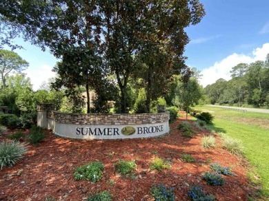 One and a half acre lot with a gorgeous view down the 16th par 4 on The Golf Club At Summerbrooke in Florida - for sale on GolfHomes.com, golf home, golf lot