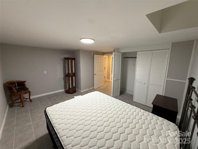 Located in the prestigious Rumbling Bald on Lake Lure, this on Rumbling Bald Resort on Lake Lure in North Carolina - for sale on GolfHomes.com, golf home, golf lot