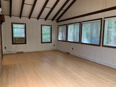Single story living in Historic Buck Hill Falls.  This 3 bedroom on Buck Hill Golf Club  in Pennsylvania - for sale on GolfHomes.com, golf home, golf lot