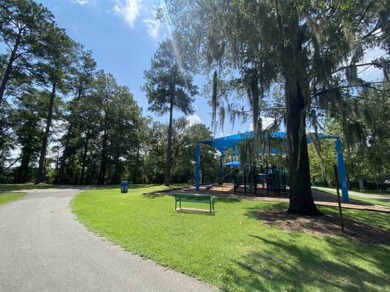 One and a half acre lot with a gorgeous view down the 16th par 4 on The Golf Club At Summerbrooke in Florida - for sale on GolfHomes.com, golf home, golf lot