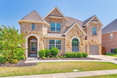 Discover lakeside living at its finest in this stunning on The Tribute At the Colony in Texas - for sale on GolfHomes.com, golf home, golf lot