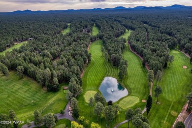 REDUCED PRICE FOR A LUCKY NEW OWNERS!! Nestled among towering on Pinetop Lakes Golf and Country Club in Arizona - for sale on GolfHomes.com, golf home, golf lot