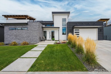 Welcome to Luxury Living overlooking panoramic views of lakes on Pelican Lakes Golf and Country Club in Colorado - for sale on GolfHomes.com, golf home, golf lot