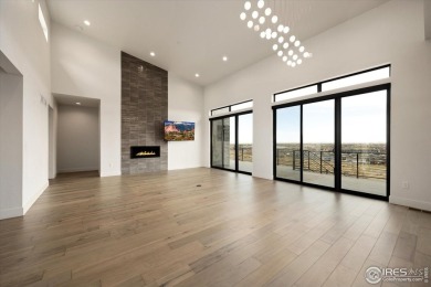Welcome to Luxury Living overlooking panoramic views of lakes on Pelican Lakes Golf and Country Club in Colorado - for sale on GolfHomes.com, golf home, golf lot