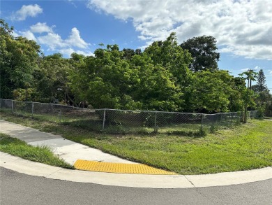 Price Reduced! Fenced-in buildable oversized corner lot in the on Bobby Jones Golf Club in Florida - for sale on GolfHomes.com, golf home, golf lot