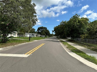 Price Reduced! Fenced-in buildable oversized corner lot in the on Bobby Jones Golf Club in Florida - for sale on GolfHomes.com, golf home, golf lot