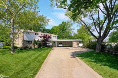 Exquisite mid-century home, just one block from the Ottumwa Golf on Ottumwa Country Club in Iowa - for sale on GolfHomes.com, golf home, golf lot