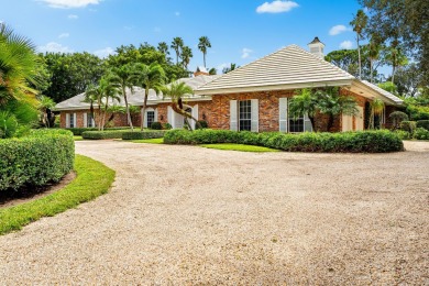 Elegant brick ranch-style estate sits on a meticulously on Country Club of Florida in Florida - for sale on GolfHomes.com, golf home, golf lot