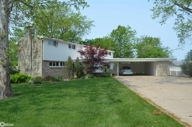 Exquisite mid-century home, just one block from the Ottumwa Golf on Ottumwa Country Club in Iowa - for sale on GolfHomes.com, golf home, golf lot