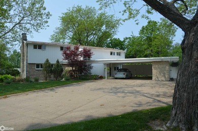 Exquisite mid-century home, just one block from the Ottumwa Golf on Ottumwa Country Club in Iowa - for sale on GolfHomes.com, golf home, golf lot