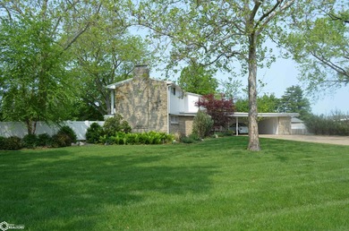 Exquisite mid-century home, just one block from the Ottumwa Golf on Ottumwa Country Club in Iowa - for sale on GolfHomes.com, golf home, golf lot