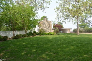 Exquisite mid-century home, just one block from the Ottumwa Golf on Ottumwa Country Club in Iowa - for sale on GolfHomes.com, golf home, golf lot