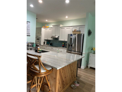 2 Bedroom plus den -can be used as third bedroom. One of a kind on Arrowhead Golf Club At Heritage Greens in Florida - for sale on GolfHomes.com, golf home, golf lot