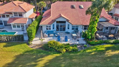 This retreat in the village of Cedar Cay blends its on Broken Sound Golf and Club  in Florida - for sale on GolfHomes.com, golf home, golf lot