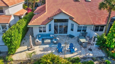 This retreat in the village of Cedar Cay blends its on Broken Sound Golf and Club  in Florida - for sale on GolfHomes.com, golf home, golf lot