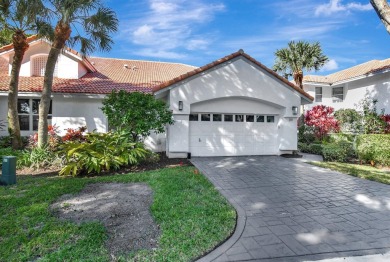 This retreat in the village of Cedar Cay blends its on Broken Sound Golf and Club  in Florida - for sale on GolfHomes.com, golf home, golf lot