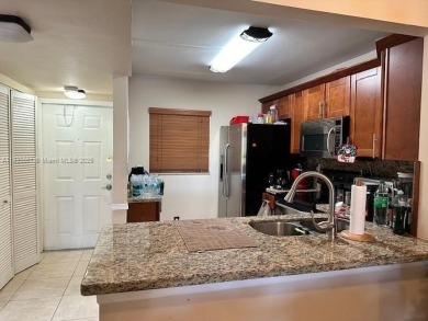 Beautiful condo in the heart of Pembroke Pines! First Floor on Pembroke Lakes Golf Club in Florida - for sale on GolfHomes.com, golf home, golf lot