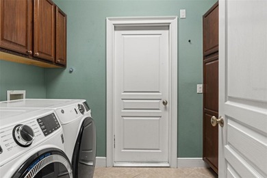 Welcome to an exceptional expression of refined Florida living on Southern Hills Plantation Club in Florida - for sale on GolfHomes.com, golf home, golf lot