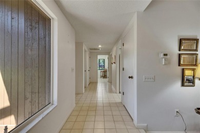 Experience 2,356 square feet of maintenance-free living in this on Saddlebrook Golf and Country Club in Florida - for sale on GolfHomes.com, golf home, golf lot